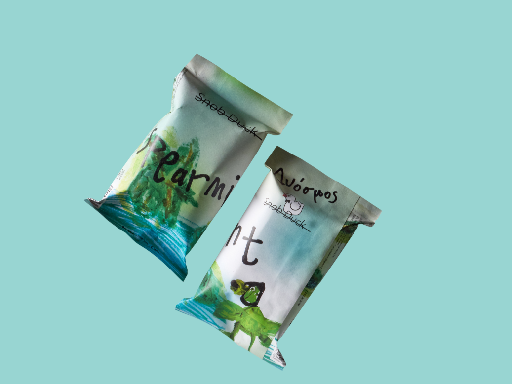 Two spearmint handcrafted artisanal soaps. 
