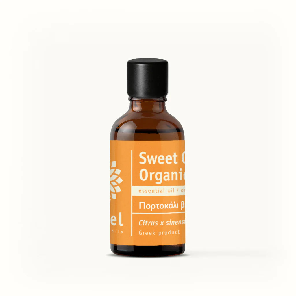 Bottle of Sweet Orange Organic essential oil by vessel with an orange label on a white background