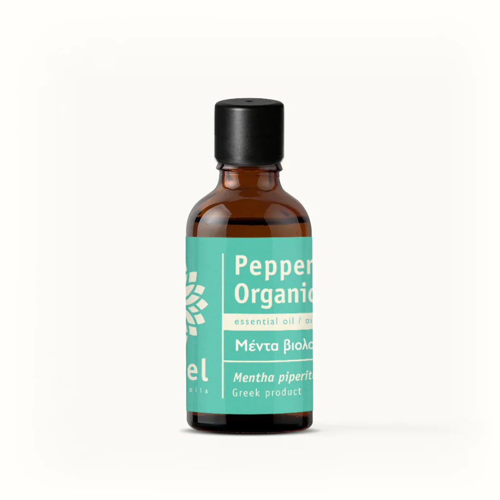 Bottle of peppermint organic essential oil with a green label on a white background